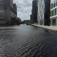 Cross over on the first bridge to the left side.  Tow path closures will change over time.  Take whichever bank is open and convenient.