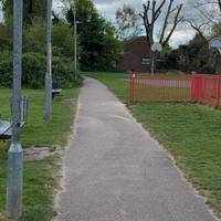 Then right to join the pavement beside the playground.