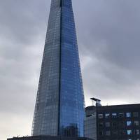 Look back for a view of the Shard. Walk down the steps on the right to join the riverside walk. Stay by the river until the Tower.