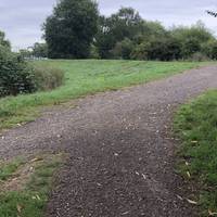 You’ll reach a junction on the footpath. Turn right and continue along the Trent Valley Greenway toward the Trent-Mersey canal.