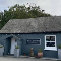The walk starts by the bus stop for the 404 / the free car park. Head to the Harbour Lights Gallery to fill your cultural boots.