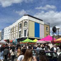 Turn left on Portobello Road, make your way north, or take an early pit stop with street food from around the world in Acklam Village.