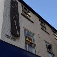 Keep walking up Halford Street and keep your eyes peeled for interesting signs. Look up high!