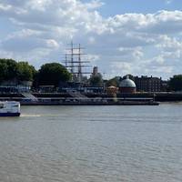 If you take the path down to the riverside you can see the south entrance across the Thames with the masts of the Cutty Sark behind.