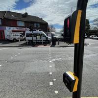 Walk to the crossing and head over Two Mile Hill Road.