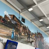 Before you leave the main exit of the train station, turn and look up at the mural of the town’s heritage, by Nigel Fletcher from 2001.