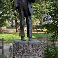 We start this walk in the beautiful Red Lion Square, welcomed by the Statue of Fenner Brockway.