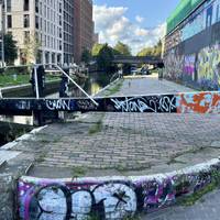 Keep along the towpath with the canal on your left. Walk on past the bottom lock.