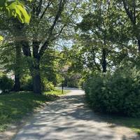 Keep following the walkway towards the water.