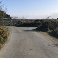 Turn left from the car park entrance/exit heading on the road down to Trevellas.