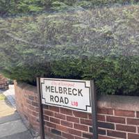 Continue along Booker Ave. Turn right down Melbreck Rd.
