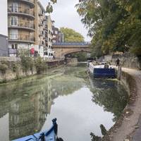Follow the bend of the canal and walk past Ropemakers field. You may hear and see the nearby St Anne’s church bell tower.