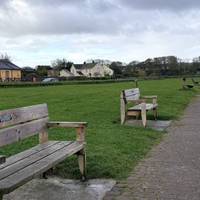 Follow the row of memorial beaches to your left.