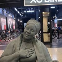 Look out for this welcome bench, just outside the XO Bike shop. The public art is a 3D print of local community activist, Stella Headley.