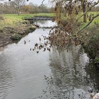 Shortly after the church there is a bridge with views of the golf course either side.