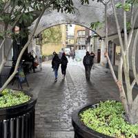 Walk under the arch at the south end of Tower Bridge. Continue ahead along Shad Thames.