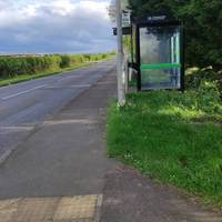 Turn right and use the pavement to pass the Park and Ride bus stop, continue straight ahead.