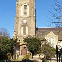 Enter the churchyard of St John's Church, on the corner of Church Road and Leytonstone High Road