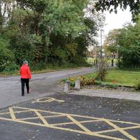 With Blackleach Visitor Centre behind you, exit the car park past the accessible spaces.