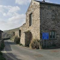 Carry on past the Old Pilchard salting cellars, built in 1792-1794 and now converted into holiday apartments.