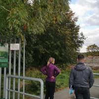 From the Littleton Road entrance to the Wetlands, walk past the barrier and follow the path that curves slightly downhill to the left.