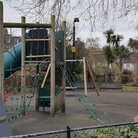 Go past the playground and tennis courts, following the path round the lake.