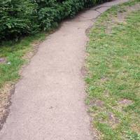 Walk up path, up steps