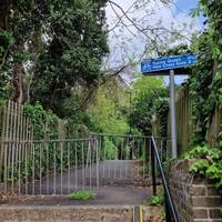 Just beyond the gardens, look for the pathway to your right.
