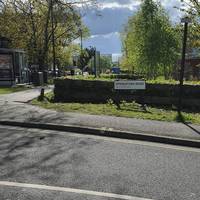 Once you pass the bus stop, turn left into Springford Road along the allotment fence.