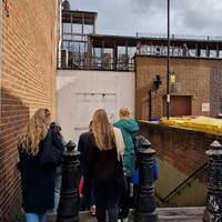 Take the underpass to Perry Vale and turn right