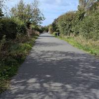 Follow the road past several cottages and a church