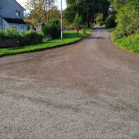 Follow the road until you see this uphill turning to the right (by postbox). Turn right to follow this track.