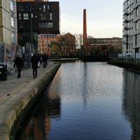 Turn right along the canal. There is an unfenced drop into the canal on the right. Cross the first bridge & continue in the same direction.