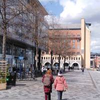 Pass the bike parking and racks and continue straight on the Friary towards the canal (Floating Harbour). There will be cafes on your left.