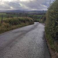 Care should be taken when walking this downhill  section as lane is narrow and cars can travel fast.