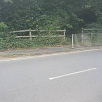 Cross Aldermoor Rd when you see the metal gate on the other side.