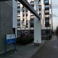 Placing the entrance to Ancoats Primary Care centre behind you, turn left along the pavement.