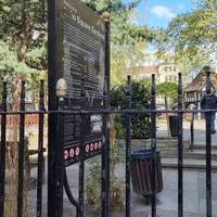 Turn around and enter Soho Square Gardens.