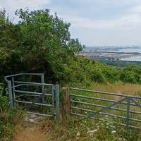 Go through the first kissing gate on your right and follow the path on your left hand side