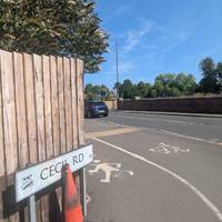 At the end of Cecil Rd turn left onto Dogool Lane and cross the road at the traffic lights to rejoin the National Cycle Route 5.